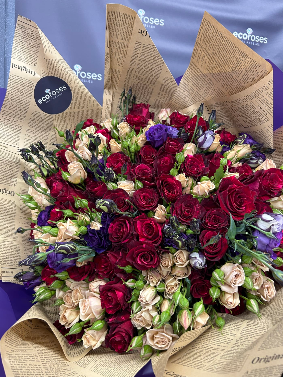 Bouquet named 'CrimsonAndAmethyst', showcasing a stunning blend of deep crimson and rich amethyst flowers, exuding luxury and depth Flowers Delivery Glendale Ca