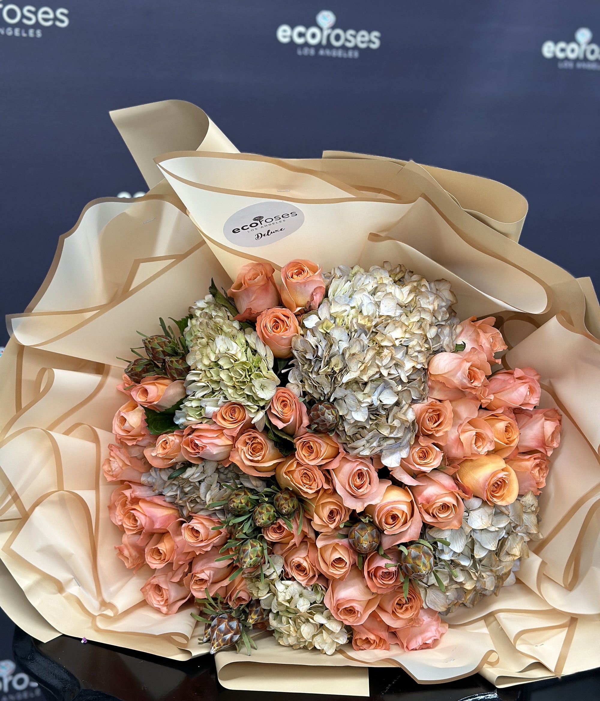 Peachy Dreamland, a deluxe bouquet featuring 50 peach roses and hydrangeas Glendale Florists