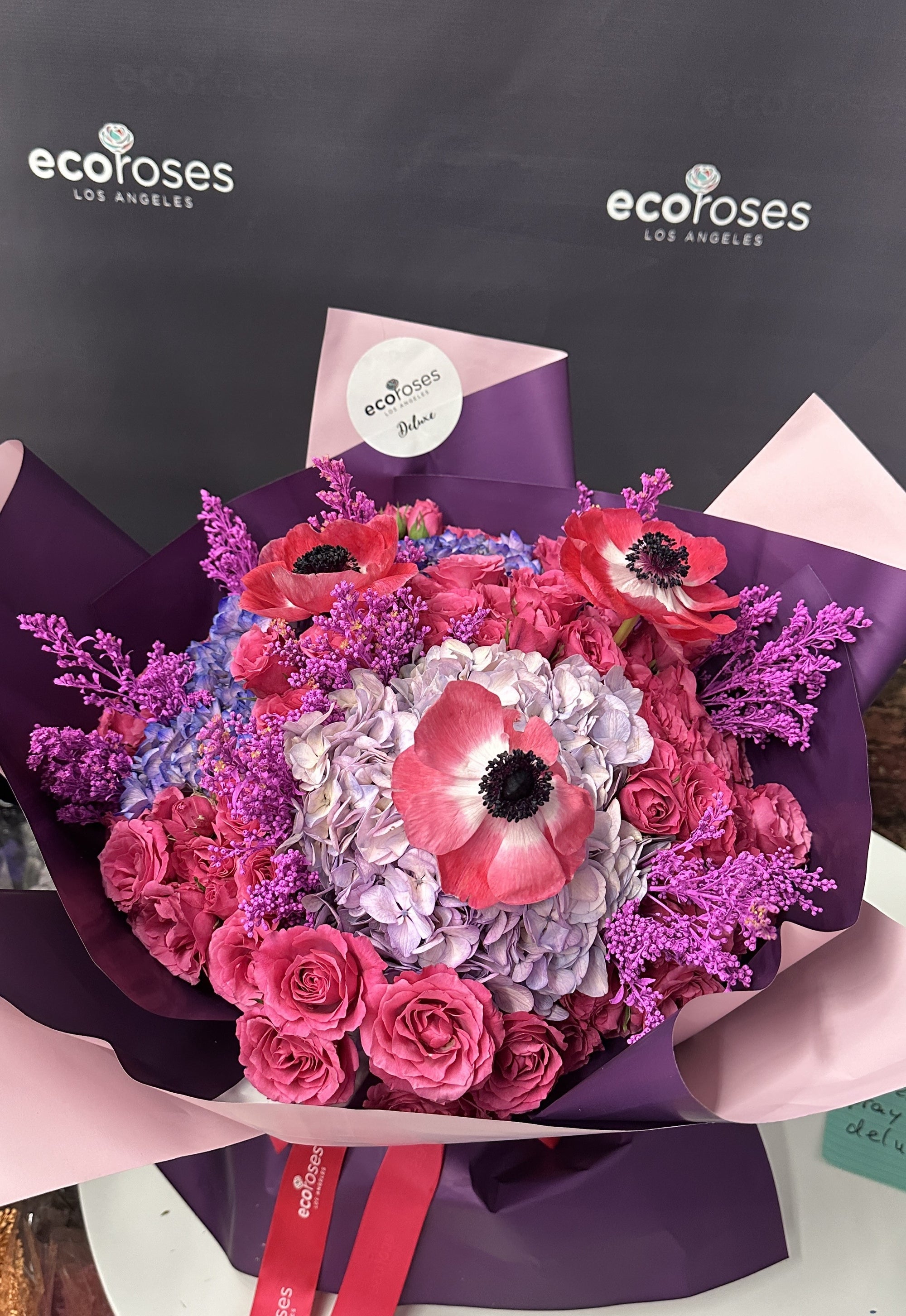 This deluxe bouquet is exquisite, with an array of anemones that will surely steal anyone's heart (including yours!). Treat yourself or someone special to the unique and stunning Anemone Amore Bouquet.