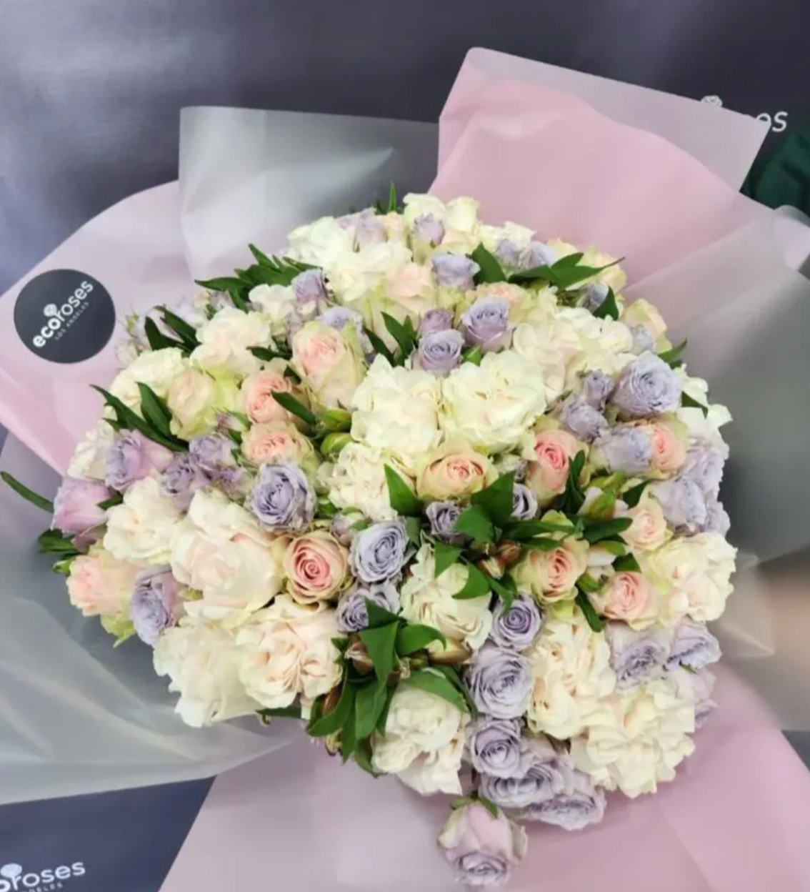 Lavender And Ivory Dreams bouquet features a beautiful combination of lavender and ivory blooms