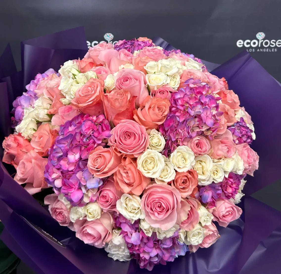 Bouquet called PinkCoralDelight, featuring a vibrant mix of pink and coral flowers, exuding joy and elegance in each bloom- Glendale Flower Delivery